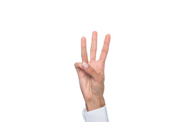 Naklejka premium cropped view of person gesturing signed language or showing three sign, isolated on white