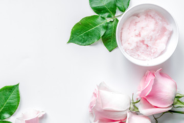 organic cosmetic with rose oil on white background top view