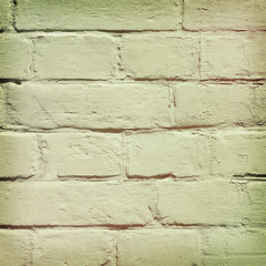 brick wall covered with  yellow lime