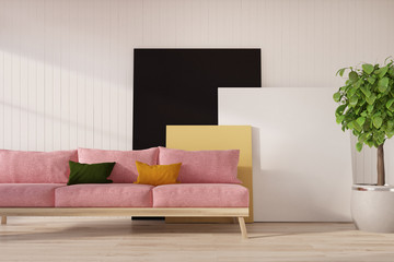 White wall, pink sofa, poster