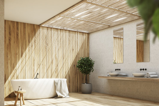 Wooden bathroom interior with a tub and a tree, side