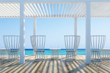 White wooden chairs and table, cocktails, seaside