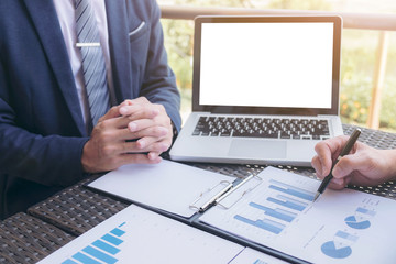 Co working, Business team meeting present, investor executive colleagues discussing new plan financial graph data on outdoors office table with laptop and tablet, Finance, accounting, investment