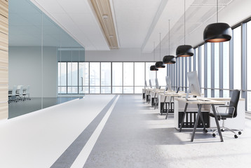 Open office interior with black round lamps