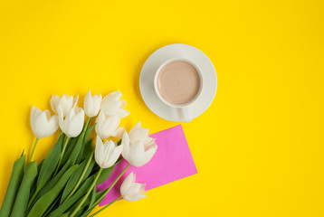 Morning coffee and flowers with greeting card