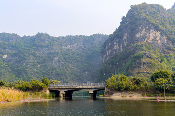 Stone bridge on the river in Tam Coc