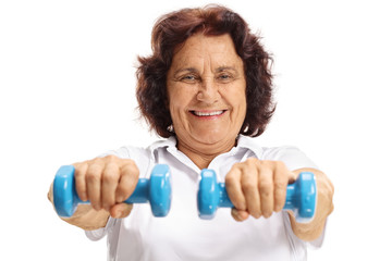 Elderly woman with small dumbbells