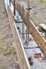 Concrete Foundation. Foundation with wooden slabs.
