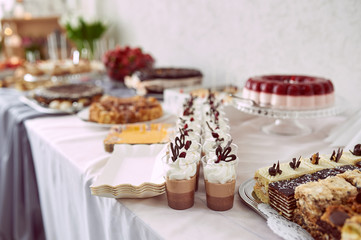 Buffet table with sweets at the wedding banquet