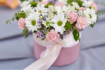 wedding bouquet in the basket on table