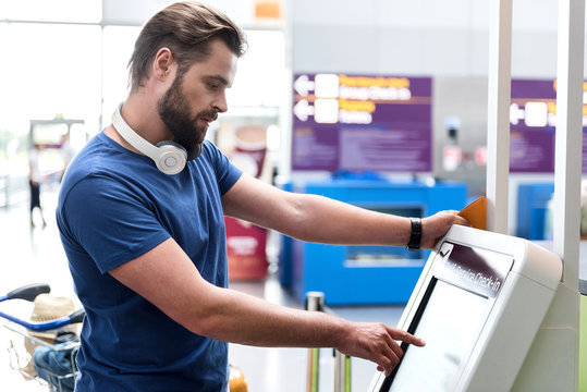 Attentive man using special equipment