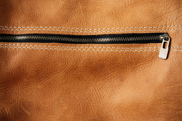 Zip of leather bag.