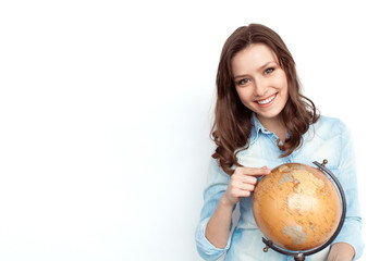 Woman with globe on white