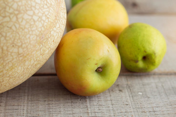 Green apples on wooden.