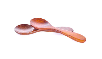 Wooden spoons on a white background