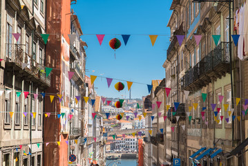 Porto, Portugal, street with decorations, view of the river
