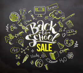 Fototapeta na wymiar Back to school sale on blackboard