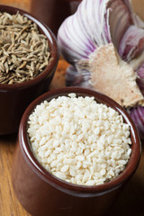 Spices and herbs in ceramic bowls. sesame seasoning. Colorful natural additives.