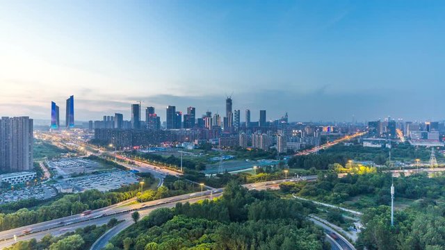 Time lapse of cityscape of nanjing Hexi new town from day to night,china