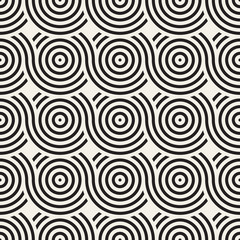 Vector seamless geometric pattern composed with circles and lines. Modern stylish rounded stripes texture. Repeating abstract background