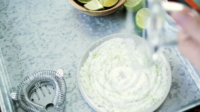 Salting rimme of glass for key lime margarita