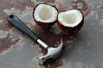 Juicy coconut in two halves with pulp 