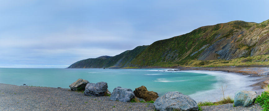 Panoramic image of Te Kopahou Reserve is located at Owhiro Bay where people can enjoy walking , cycling and also driving 4WD vehicles along the coast, Wellington , North Island of New Zealand