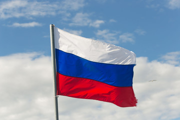 Obraz na płótnie Canvas St. Petersburg, Russia - June 28, 2017: Flag of Russia in the wind in St. Petersburg.