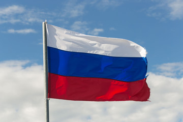 Fototapeta na wymiar St. Petersburg, Russia - June 28, 2017: Flag of Russia in the wind in St. Petersburg.