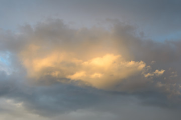 The cloud illuminated at the sunset.