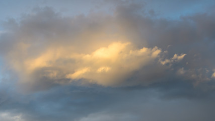 The cloud illuminated at the sunset.