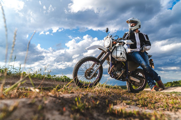 Fototapeta na wymiar travel motorcycle off road Motorcyclist gear, A motorcycle driver looks, concept, active lifestyle, enduro