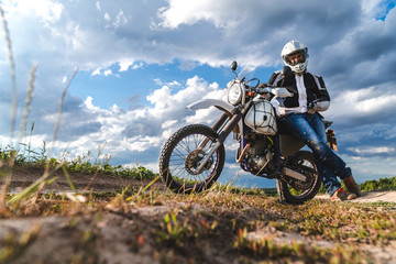 Fototapeta na wymiar travel motorcycle off road Motorcyclist gear, A motorcycle driver looks, concept, active lifestyle, enduro