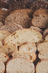 Bakery concept. Plenty of sliced bread background