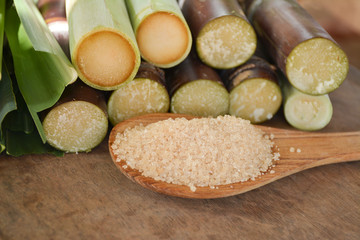 Brown sugar from sugarcane on  wooden table,Agriculture Industry concept.
