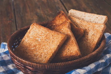 Breakfast background, toasts on checkered napkin closeup