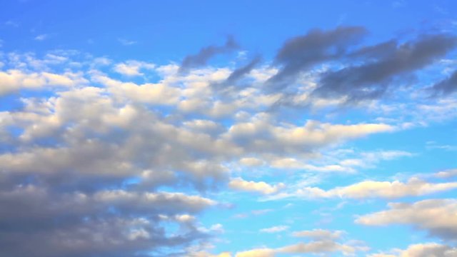 Plenty of beautiful clouds moving on blue sky. Time-Lapse of rain clouds on blue sky on a sunny day. High quality footage - Full HD (1920x1080) 