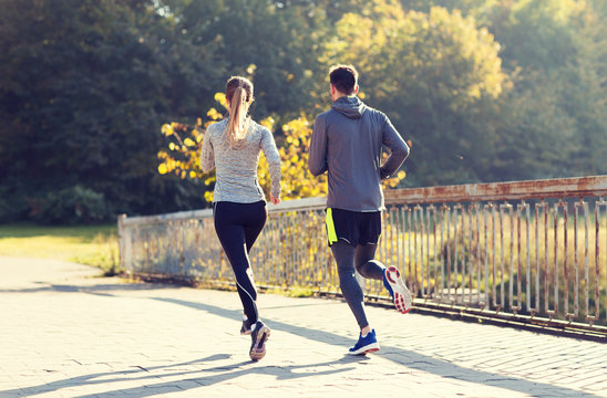 couple running or jogging outdoors