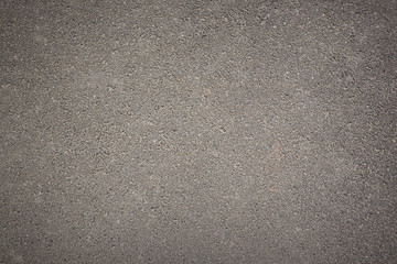 Grey background texture of rough asphalt, top view, copy space - 165442518
