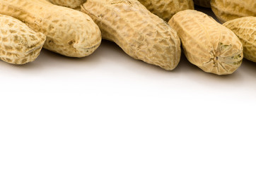 Macro closeup of Peanuts, isolated on white background
