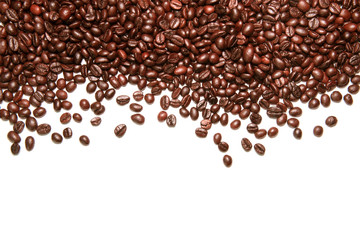Coffee beans arranged on a white background.