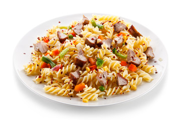Pasta with beacon and colorful vegetables
