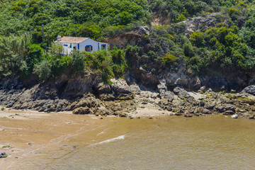 Fototapeta na wymiar House in Baia de Porto Covo beach