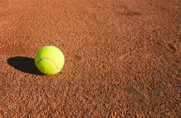 Tennis ball on a court.