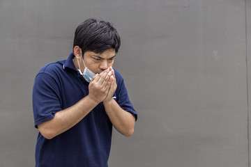 Asian man wearing mouth mask against air pollution., asia male wear mask protection , copy space for text  © Babydodge