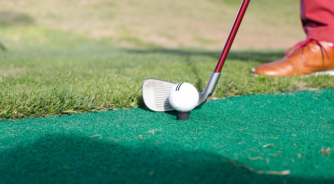 iron takes aim at the golf course