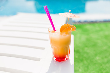 Coctail on lounge zone at pool. Time for summer photo.