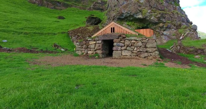 Stone Hut With Wooden Roof Fly-Away Footage