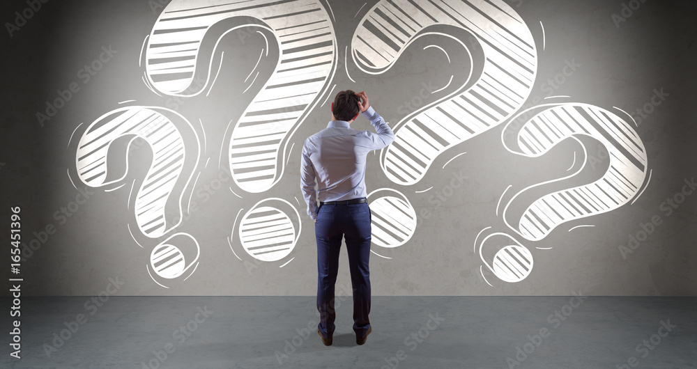 Aufkleber businessman watching a question mark sketch on a wall 3d rendering