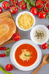 Chorba soup tomato ready-made dish served with vegetables, spice and pita bread